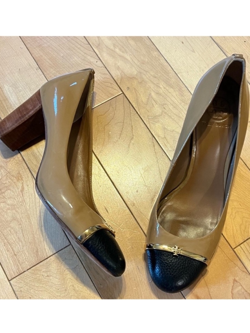 Tory Burch Cap Toe Tan and Black Color block pump heels with metal logo size ten